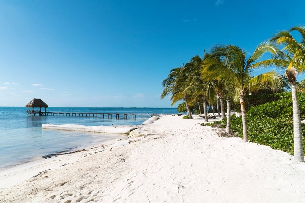 From New York to Isla Mujeres for Cheap: Beat the Cancún Fare Game